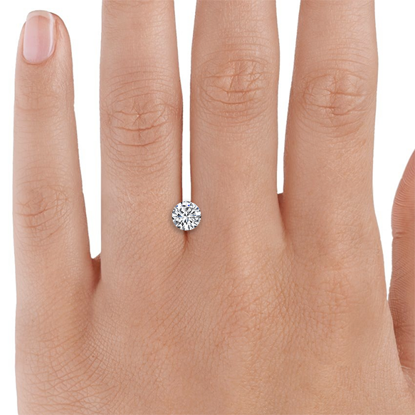 Diamond ring in hand